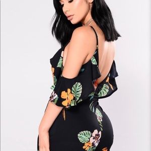 women’s floral romper and men’s floral shorts.